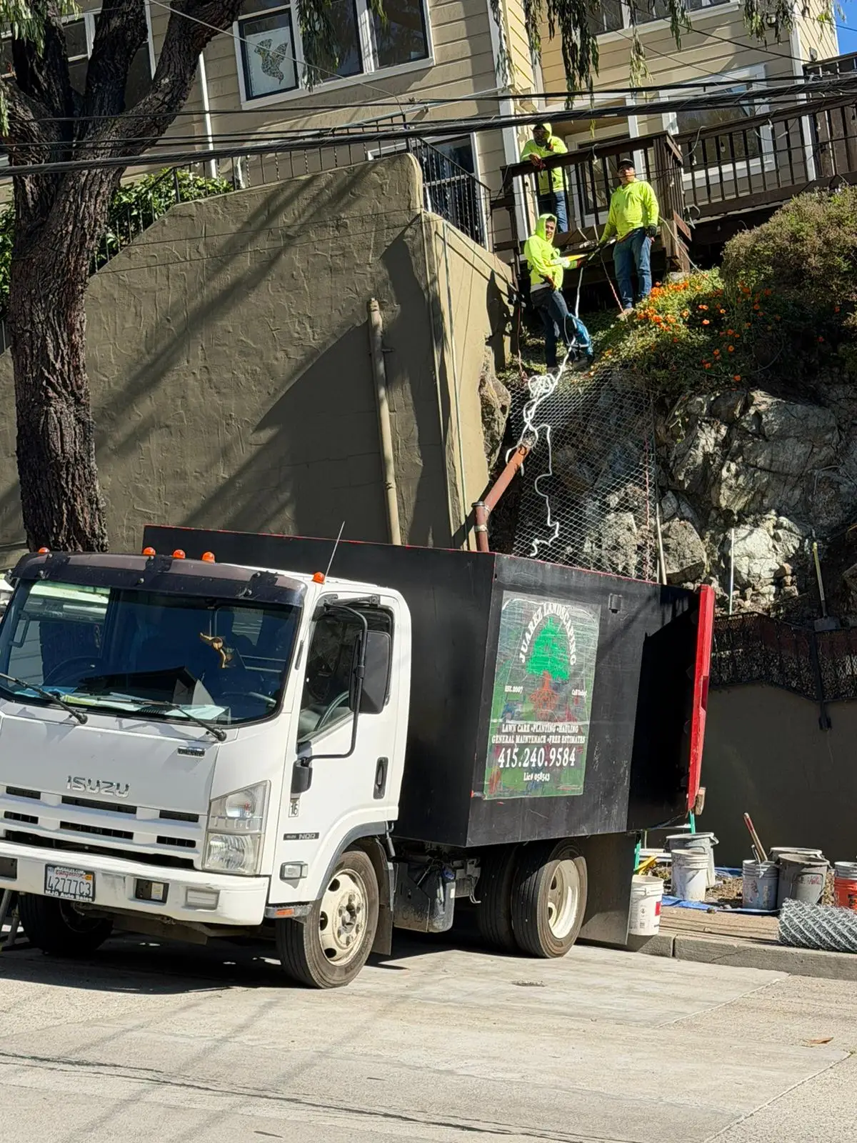 Juarez Landscaping crew working on a residential property